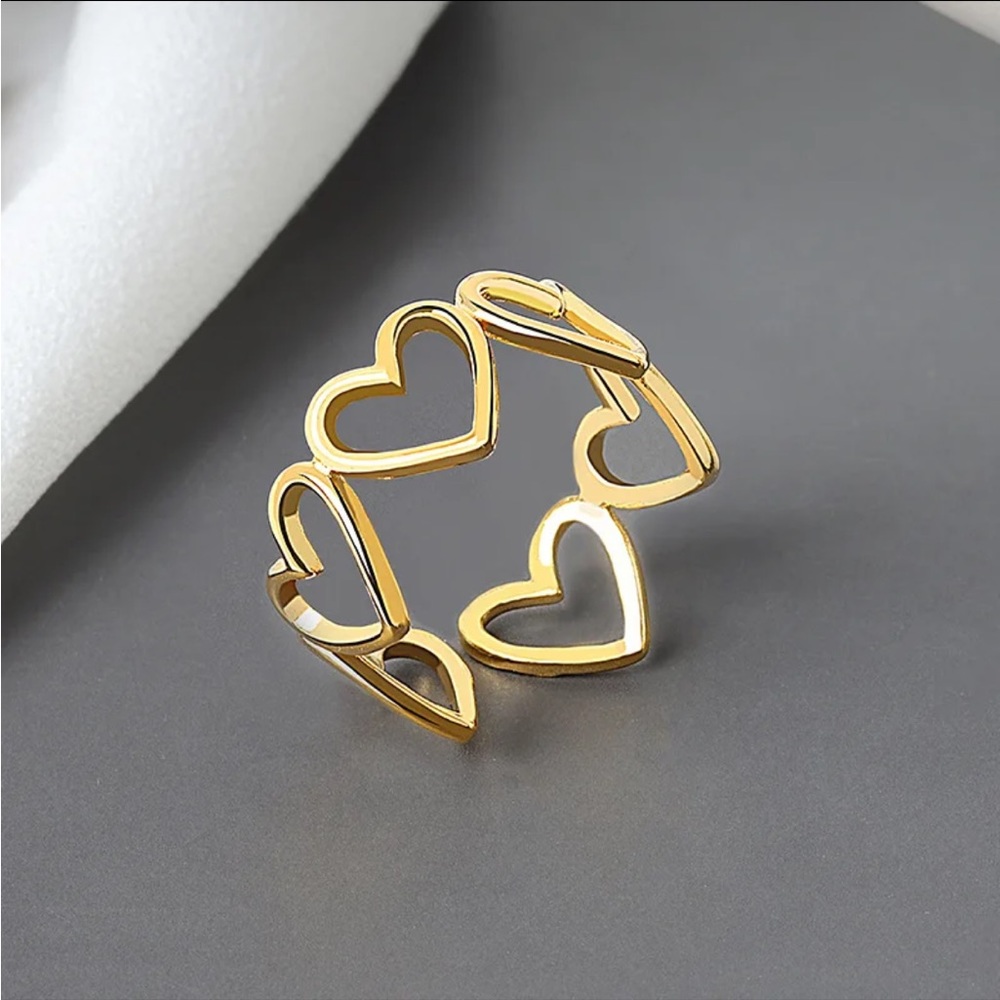 Heart ring gold color . Adjustable